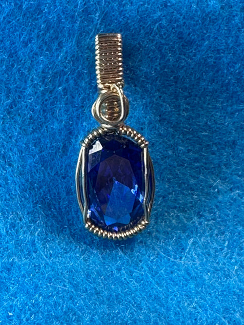 “Starborn Echo” — Blue Sapphire Pendant
